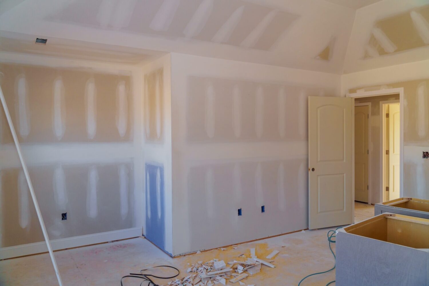 walls plasterboards with room under construction with finishing putty in the room